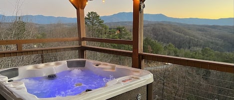 Soak in the panoramic sunset in the four-person hot tub. 