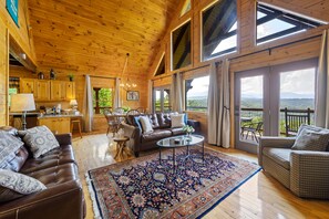 The view is truly breathtaking from this cozy yet spacious den.