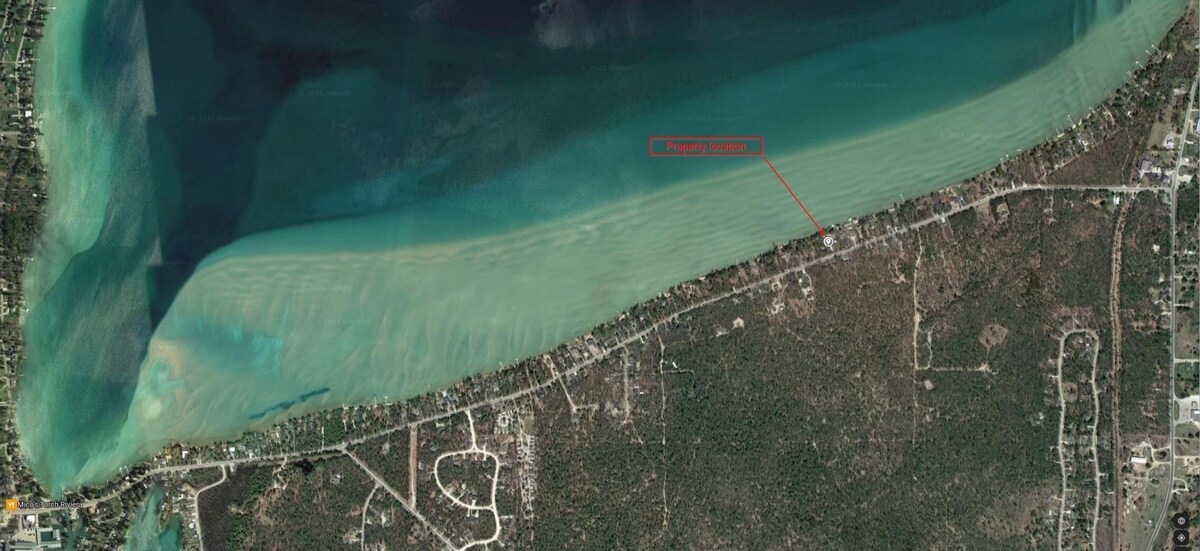 Torch Lake Sandbar Waterfront Home – with Dock!