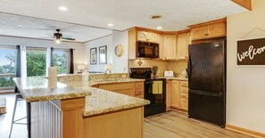 Kitchen with Granite Countertops and Modern Appliances