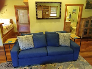 A near-new and very comfortable queen sofa bed. A built in queen seen in rear...