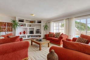 Living room with pool views