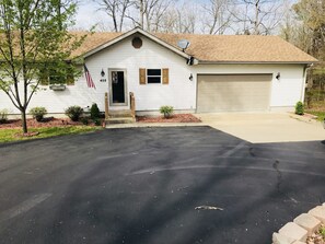 FRONT OF HOUSE AND PARKING AREA