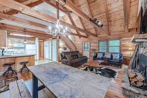 Large dining table open to the living room and Kitchen.