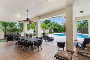 Lanai with Grill & Dining Area By The Pool