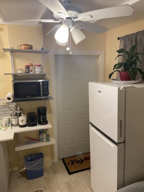 Full kitchen with stove fridge and sink