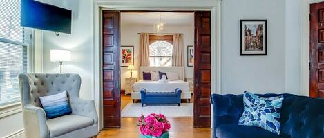 Grand pocket doors separate the first-floor king suite from the living room. The massive historic Bonnycastle Villa is within walking distance of some of the area's best boutique shops and local restaurants.