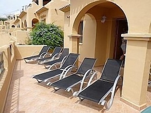 lower teracce with enough space for up to 8 sunbeds and a stunning view
