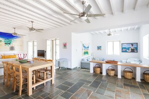 Spacious living room connects to dining, sunken lounge and kitchen areas