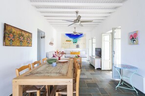 Dining room opens on living room, lounge and open-plan kitchen