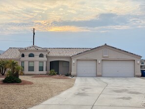 Front of house, garage & 35’ boat deep garage, & RV parking w/ full hook-ups