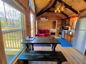 Our tiny homes have a limited environmental impact using logs from US Forest Service Sustainable Forests, radiant insulation, gas fireplaces and high efficiency mini split heating and air conditioning.