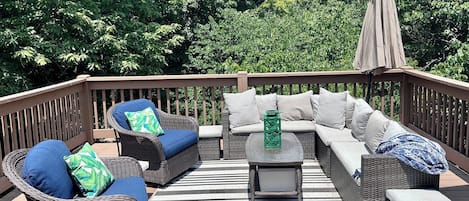 Outdoor sitting area off Master bedroom. Easy access from living room to.