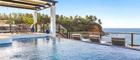 One of a king infinity pool with ocean views!