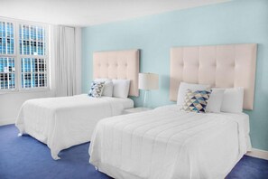 Bedroom with 2 Double beds. The exact unit will be assigned upon arrival. Views, colors, and decor may vary