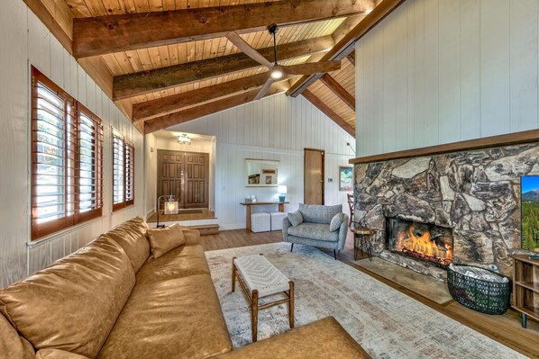 Grab a blanket from the basket and curl up on the sectional to watch a movie or enjoy the warmth of the fireplace.