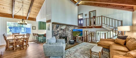 The dining area connects with living room with the kitchen, making it easy to flow between the main gathering places in this home.