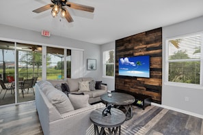 Inviting living area of the townhouse in Davenport Florida - Cozy seating area conducive to relaxation and socializing - Smart TV and netflix - Chic and contemporary living room design with clean lines and modern furnishings