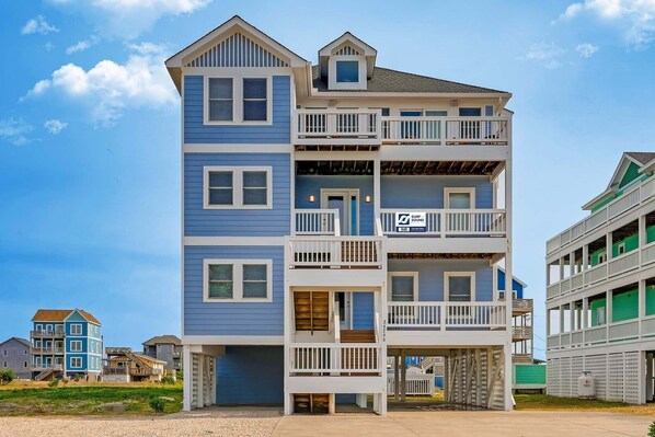 surf-or-sound-realty-949-caribbean-wave-drone-ground-exterior-front