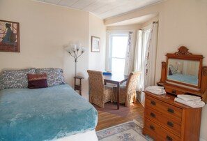 Bedroom & bay windows, plus vintage dresser with mirror.