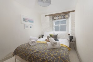 Oriel Cottage, St Agnes. First floor: Bedroom one offers a sumptuous double bed