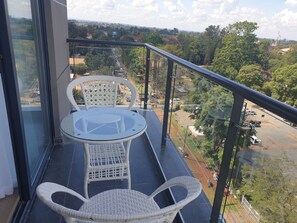 Master bedroom balcony with a view of the green Lavington area.