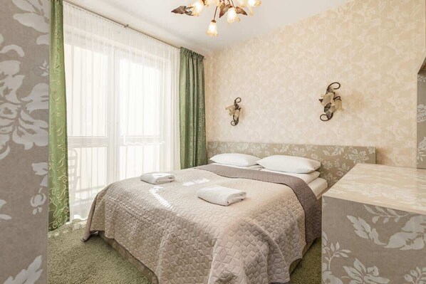 Cozy bedroom in the apartment. 