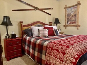 Bedroom 2 has a comfy queen bed, located on the lower level of the townhome