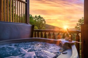 Relax in the hot tub while admiring the incredible view.
