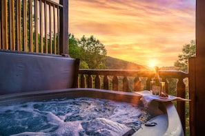 Relax in the hot tub while admiring the incredible view.
