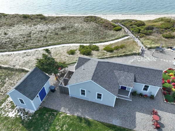 Home from above showing path to beach