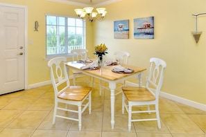Dining area with a table for 4 guests