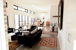 Living room looking towards dining  area.
Beautiful natural light and space 