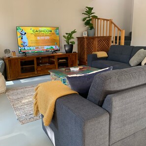 Lounge, smart tv and games cupboard 