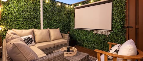 Relax in the Courtyard and Watch your Favorite Movie