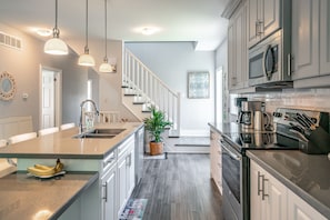 Fully functional kitchen with stainless steel appliances