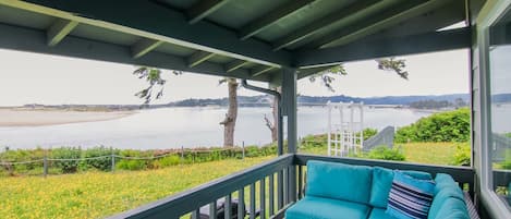 Expansive bay and ocean views from the comfort of the covered porch.