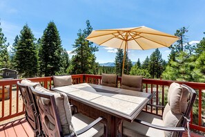 Dine under the open sky with breathtaking mountain and forest views.