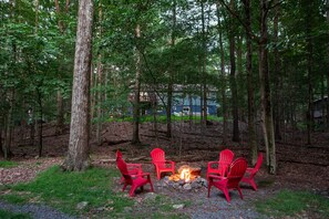 Stoke the Fun with S'mores at Our Fire Pit, Where the Woods Come Alive with Warmth and Laughter!