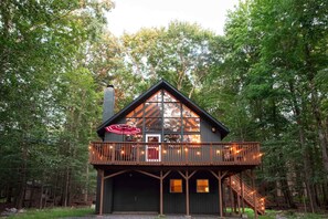 Embrace the tranquility of nature in our beautiful cabin in the woods.