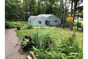 View of the cottage from the parking area.