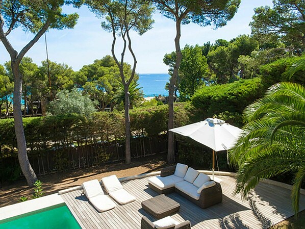 Property, Plant, Building, Sky, Furniture, Tree, Azure, Shade, Outdoor Furniture, Swimming Pool