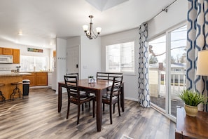 Dining area. Table expands to seat up to 8 people.