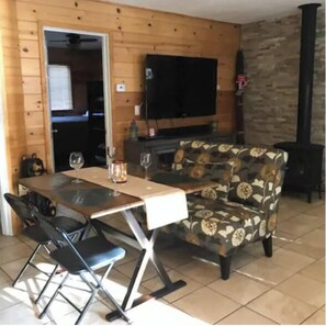 Fold out table in the family room for dining for 4.
