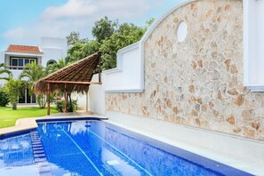 Large complex pool with palapa-shaded area to spend the day at the pool.