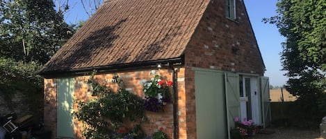 Pretty exterior of The Annex in the summer sunshine