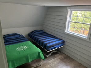 Second bedroom — two twin beds