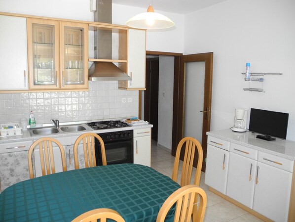 Kitchen area. Dining area