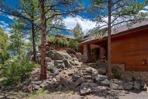 Natural landscaping and private nooks all around the house