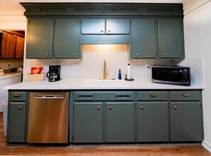 kitchen-stainless steel dishwasher, microwave, coffee pot, beautiful backsplash